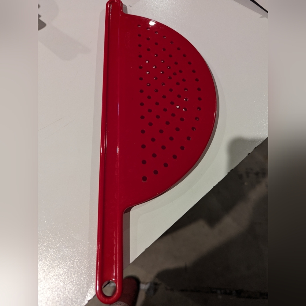 Side of pot strainer for pasta or whatever